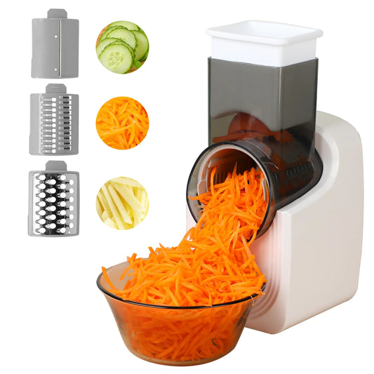 Vegetable shredder with different attachments and shredded vegetables displayed.