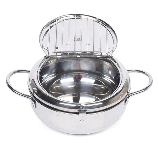 Stainless steel double boiler with open lid on a white background